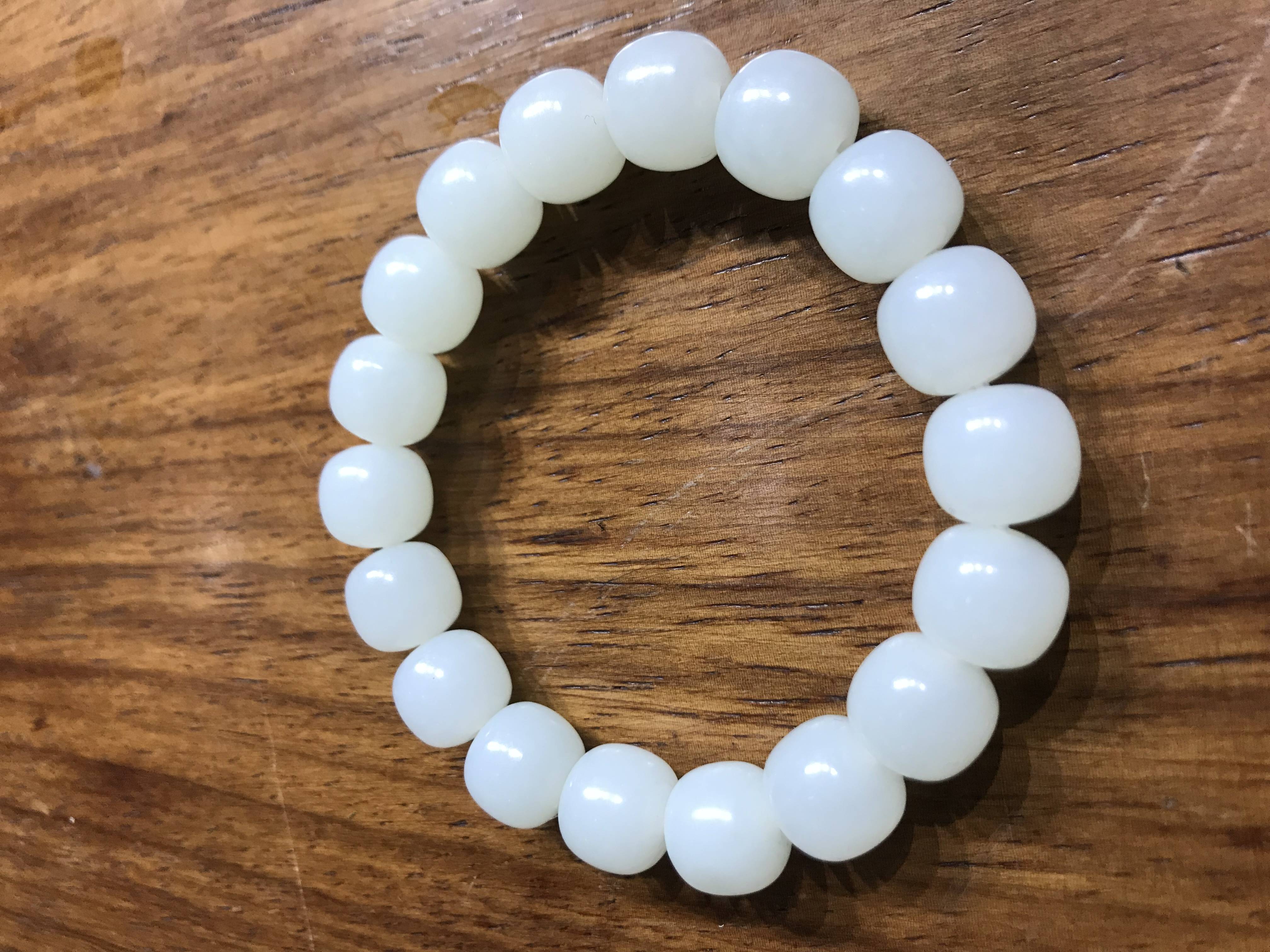 新疆和田玉原毛孔皮白玉籽玉手链 圆圆满满