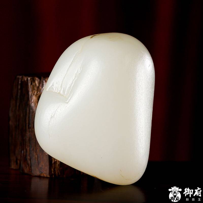新疆和田玉原毛孔皮黄皮白玉籽玉原石 131克