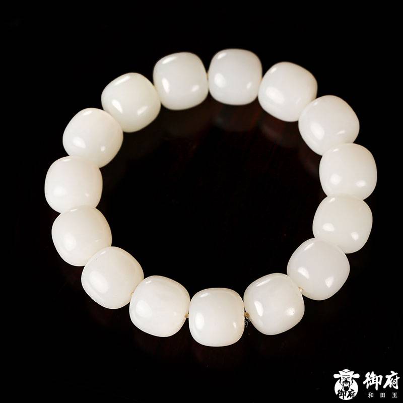 新疆和田玉原毛孔皮羊脂白玉籽玉桶珠手串 85.6克