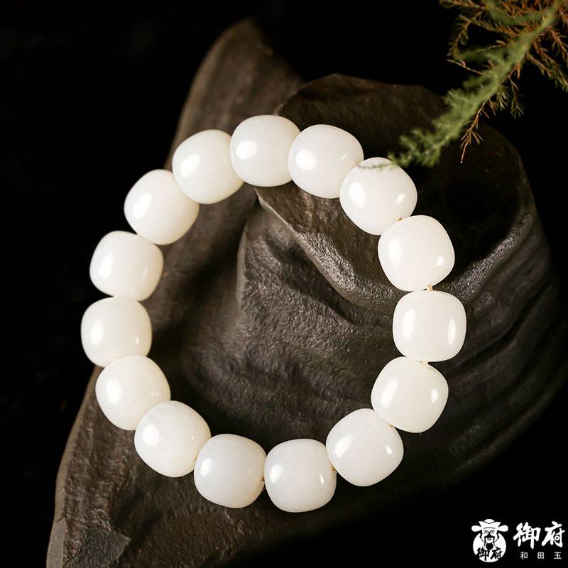 新疆和田玉原毛孔皮羊脂白玉籽玉桶珠手串 85.6克 圖片7