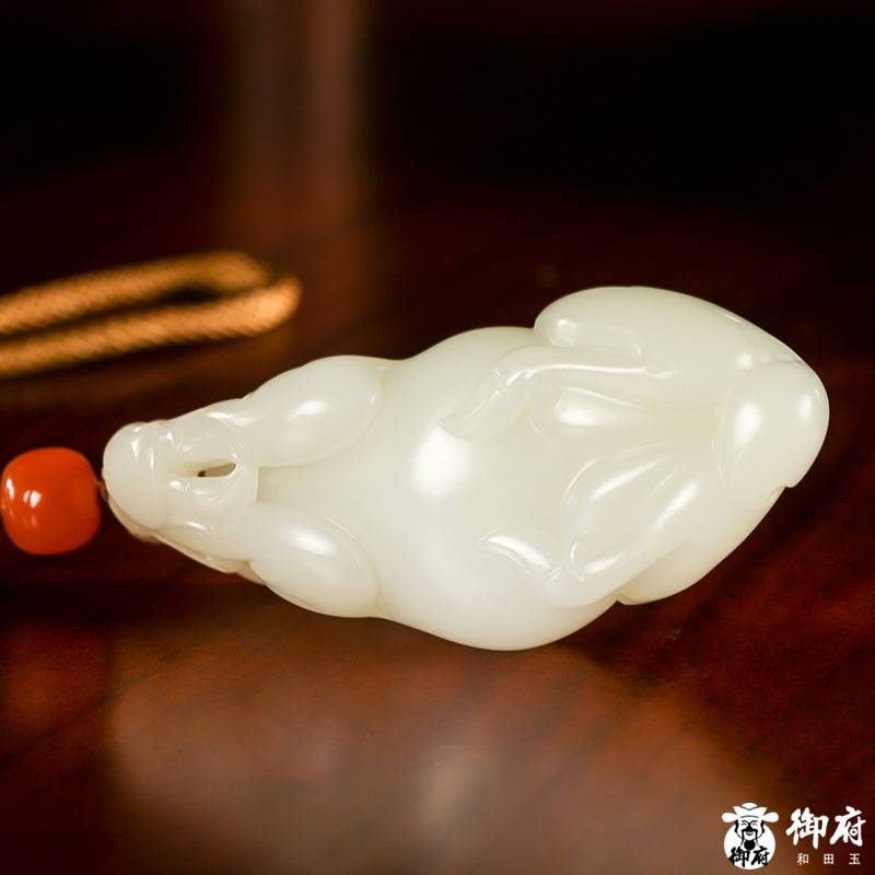 新疆和田玉原毛孔皮白玉籽玉把件 路路通 105克 圖片7